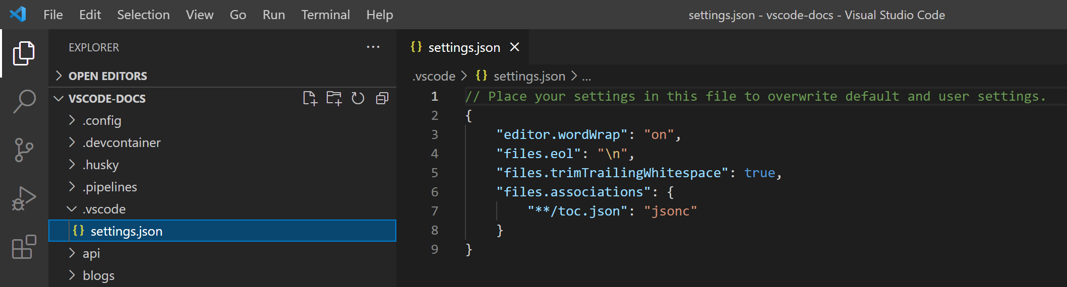 The File Explorer displaying settings.json under the .vscode folder