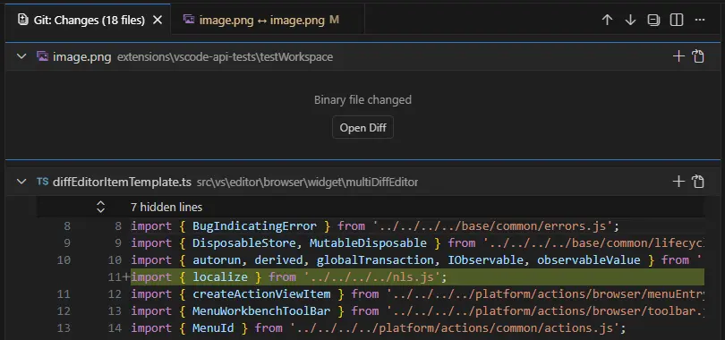 Screenshot showing a binary file placeholder and Open Diff action in a multi-file diff.